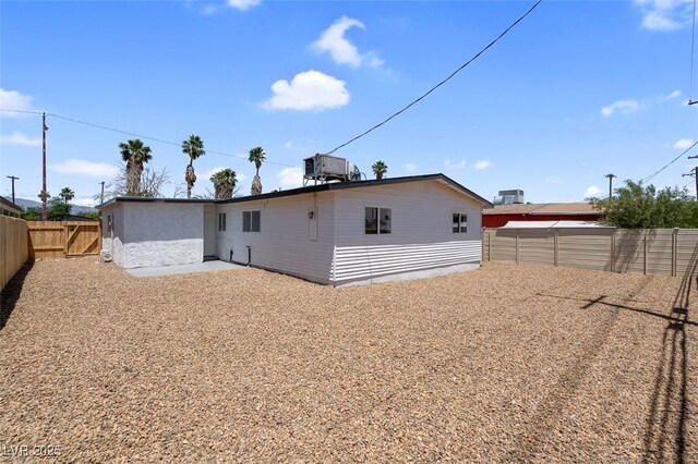 1115 W Nelson Ave, North Las Vegas, NV 89030 - back of house featuring a fenced backyard and cooling unit