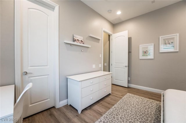 2896 Grande Arch St, Henderson, NV 89044 - bedroom with light wood-style flooring and baseboards