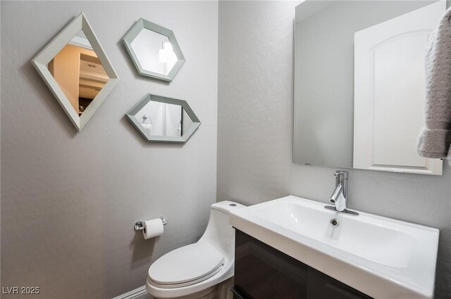 2896 Grande Arch St, Henderson, NV 89044 - half bathroom with vanity and toilet