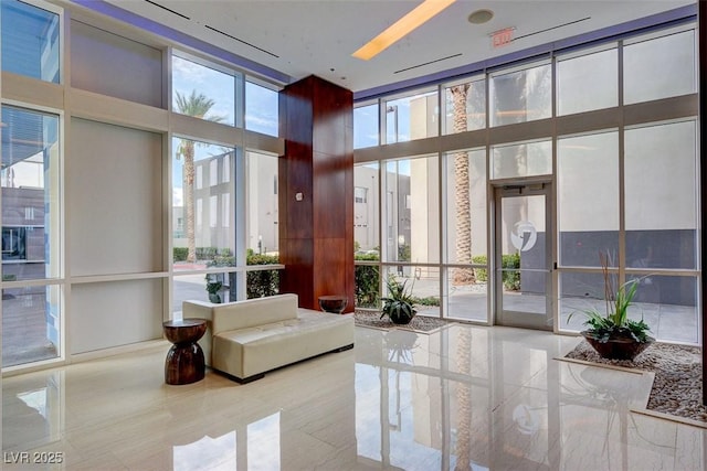 4525 Dean Martin Dr Unit 2109, Las Vegas, NV 89103 - lobby with expansive windows and a towering ceiling