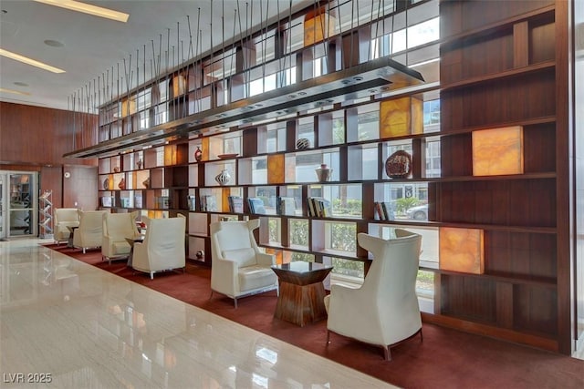 4525 Dean Martin Dr Unit 2109, Las Vegas, NV 89103 - building lobby featuring a towering ceiling and wood walls