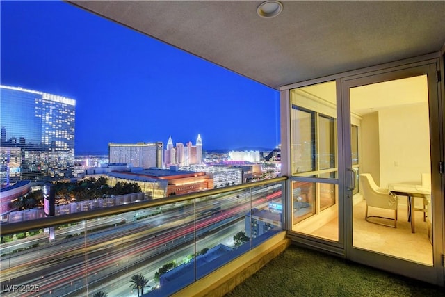4525 Dean Martin Dr Unit 2109, Las Vegas, NV 89103 - balcony at twilight featuring a view of city lights