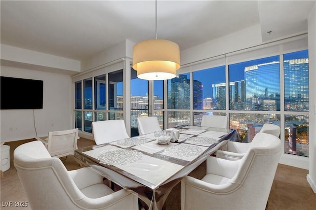 4525 Dean Martin Dr Unit 2109, Las Vegas, NV 89103 - dining space featuring a city view and plenty of natural light