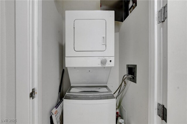 4525 Dean Martin Dr Unit 2109, Las Vegas, NV 89103 - laundry room with stacked washer / dryer