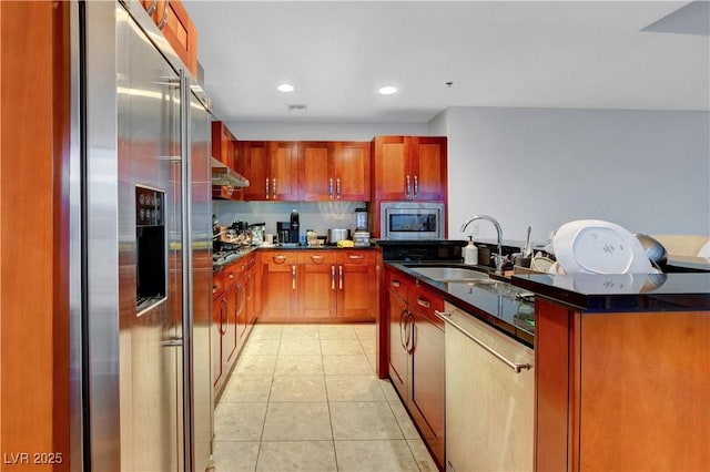 4525 Dean Martin Dr Unit 2109, Las Vegas, NV 89103 - kitchen with stainless steel appliances, a sink, light tile patterned floors, extractor fan, and recessed lighting