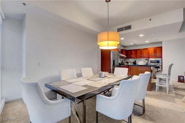 4525 Dean Martin Dr Unit 2109, Las Vegas, NV 89103 - dining space featuring light colored carpet, baseboards, and recessed lighting