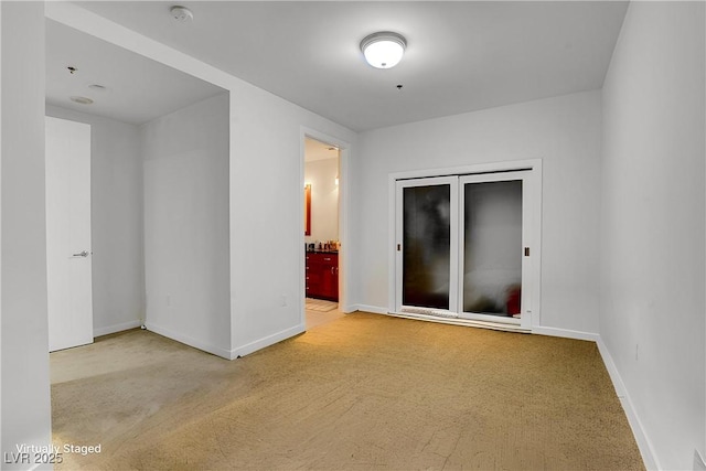 4525 Dean Martin Dr Unit 2109, Las Vegas, NV 89103 - spare room with carpet, baseboards, and a smoke detector