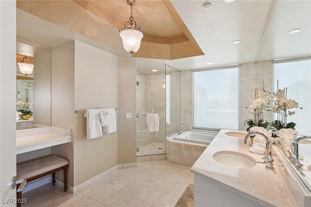 222 Karen Ave Unit 3208, Las Vegas, NV 89109 - bathroom featuring a bath, a shower stall, baseboards, double vanity, and recessed lighting