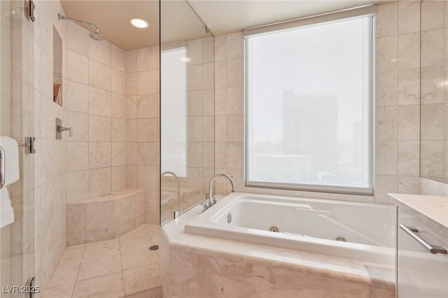 222 Karen Ave Unit 3208, Las Vegas, NV 89109 - full bath with a stall shower, a jetted tub, recessed lighting, tile patterned floors, and tile walls