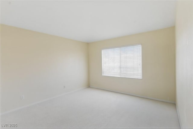 9785 Turtle Head Ct, Las Vegas, NV 89117 - carpeted spare room with baseboards