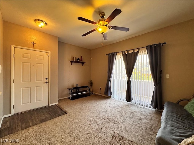 5750 E Hacienda Ave Unit 107, Las Vegas, NV 89122 - carpeted foyer featuring a ceiling fan and baseboards