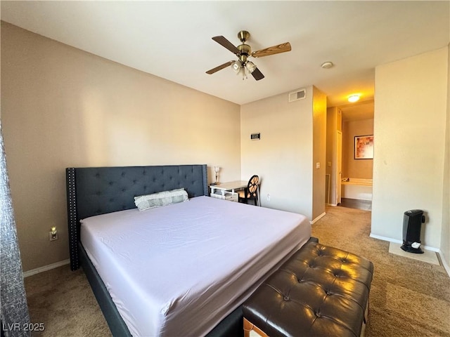 5750 E Hacienda Ave Unit 107, Las Vegas, NV 89122 - carpeted bedroom with baseboards and ceiling fan