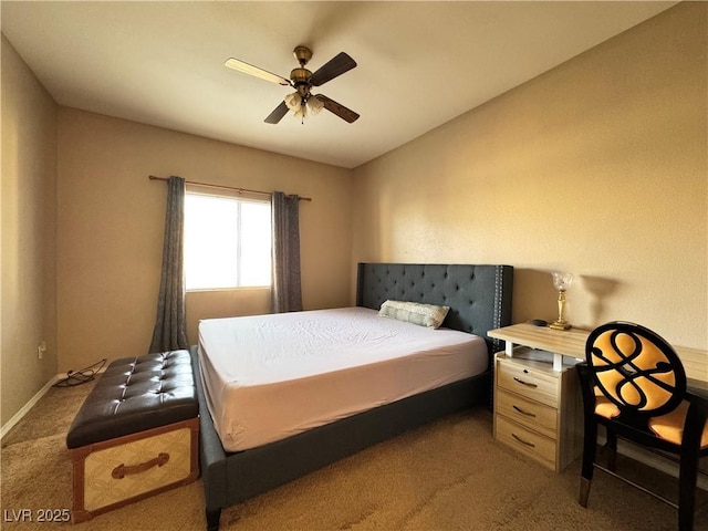 5750 E Hacienda Ave Unit 107, Las Vegas, NV 89122 - carpeted bedroom with a ceiling fan and baseboards