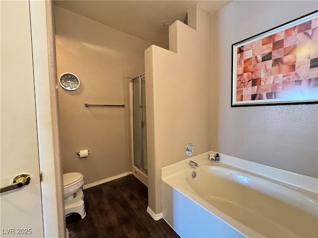 5750 E Hacienda Ave Unit 107, Las Vegas, NV 89122 - full bathroom featuring a bath, wood finished floors, and a stall shower