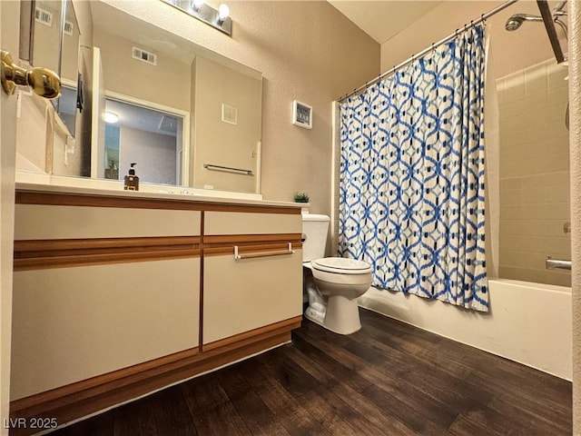 5750 E Hacienda Ave Unit 107, Las Vegas, NV 89122 - bathroom with wood finished floors, shower / bath combination with curtain, and vanity