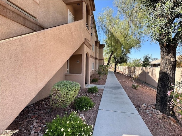 5750 E Hacienda Ave Unit 107, Las Vegas, NV 89122 - view of side of property with stucco siding