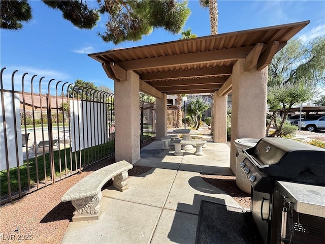 5750 E Hacienda Ave Unit 107, Las Vegas, NV 89122 - view of patio featuring area for grilling