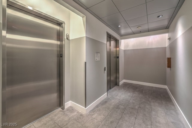 900 Las Vegas Blvd Unit 1208, Las Vegas, NV 89101 - hall featuring elevator, a drop ceiling, baseboards, and recessed lighting