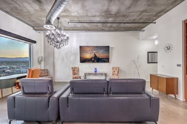 900 Las Vegas Blvd Unit 1208, Las Vegas, NV 89101 - living room with a chandelier, baseboards, and concrete floors