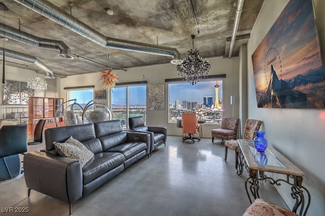 900 Las Vegas Blvd Unit 1208, Las Vegas, NV 89101 - living room featuring a chandelier and finished concrete floors