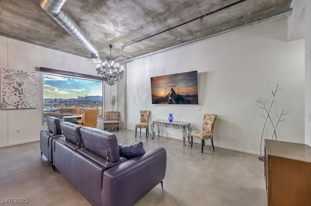 900 Las Vegas Blvd Unit 1208, Las Vegas, NV 89101 - living room featuring finished concrete flooring, a chandelier, and baseboards