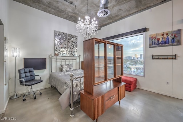 900 Las Vegas Blvd Unit 1208, Las Vegas, NV 89101 - bedroom with finished concrete floors, a chandelier, baseboards, and access to exterior