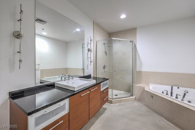 900 Las Vegas Blvd Unit 1208, Las Vegas, NV 89101 - bathroom featuring vanity, a bath, a stall shower, and recessed lighting