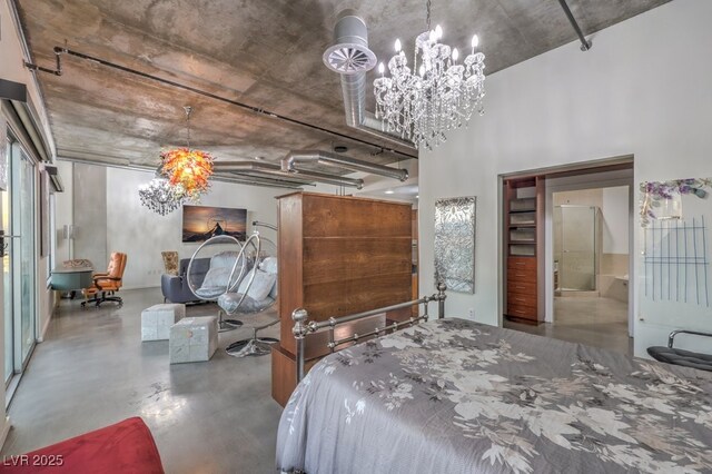 900 Las Vegas Blvd Unit 1208, Las Vegas, NV 89101 - bedroom featuring finished concrete floors and a chandelier