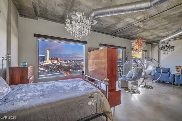 900 Las Vegas Blvd Unit 1208, Las Vegas, NV 89101 - bedroom featuring a chandelier and finished concrete floors