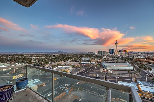 900 Las Vegas Blvd Unit 1208, Las Vegas, NV 89101 - balcony at dusk featuring a view of city and a mountain view