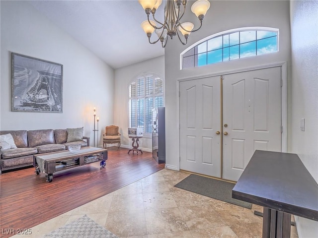 2732 Dune Cove Rd, Las Vegas, NV 89117 - tiled entrance foyer featuring a chandelier and high vaulted ceiling