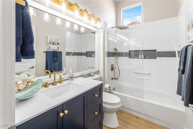 10504 Button Willow Dr, Las Vegas, NV 89134 - bathroom featuring vanity, toilet, wood finished floors, and washtub / shower combination