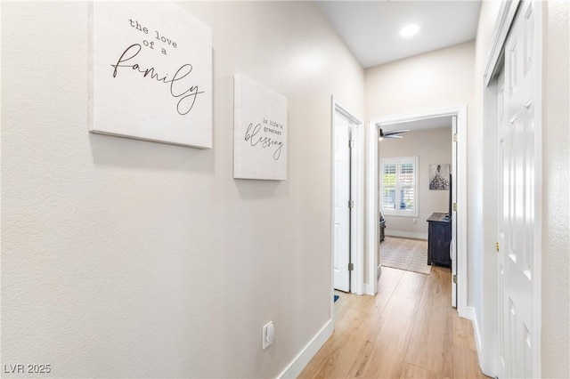 10504 Button Willow Dr, Las Vegas, NV 89134 - hallway with light wood-style floors and baseboards