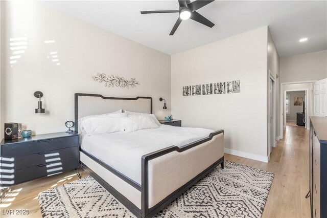 10504 Button Willow Dr, Las Vegas, NV 89134 - bedroom featuring light wood-style floors, ceiling fan, and baseboards