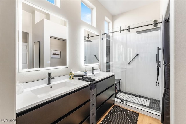 10504 Button Willow Dr, Las Vegas, NV 89134 - bathroom with a shower stall and two vanities