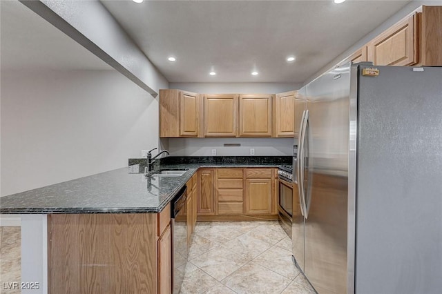 839 Benita Pl, Boulder City, NV 89005 - kitchen with appliances with stainless steel finishes, a sink, recessed lighting, a peninsula, and dark stone countertops