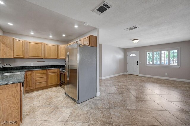 839 Benita Pl, Boulder City, NV 89005 - kitchen with stainless steel appliances, a sink, baseboards, recessed lighting, and open floor plan