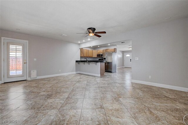 839 Benita Pl, Boulder City, NV 89005 - unfurnished living room featuring ceiling fan, baseboards, and recessed lighting