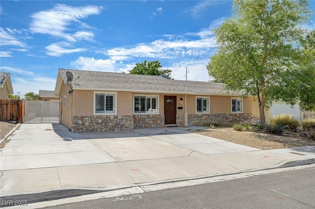 839 Benita Pl, Boulder City, NV 89005 - single story home with stucco siding, stone siding, and a gate
