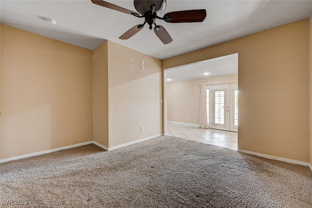 839 Benita Pl, Boulder City, NV 89005 - carpeted empty room featuring a ceiling fan, baseboards, tile patterned flooring, and a smoke detector