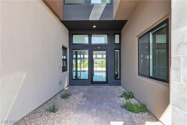 5364 Succulent Rose Dr, Las Vegas, NV 89135 - view of exterior entry featuring stucco siding and french doors