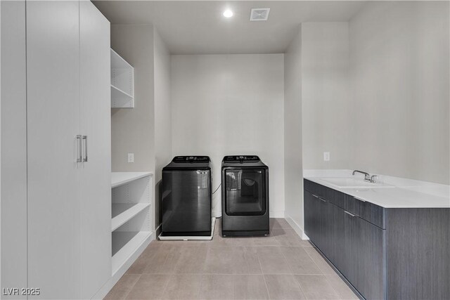 5364 Succulent Rose Dr, Las Vegas, NV 89135 - washroom featuring washer and clothes dryer and light tile patterned floors