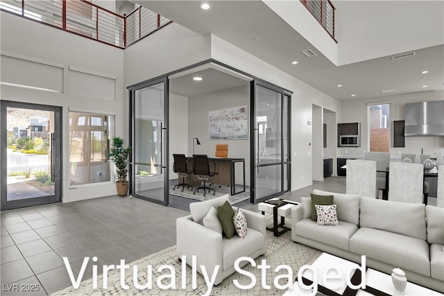 5364 Succulent Rose Dr, Las Vegas, NV 89135 - living area featuring a high ceiling, plenty of natural light, recessed lighting, tile patterned floors, and an office area