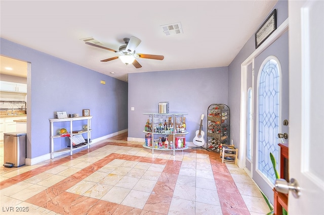 1112 Sandy Cove St, Las Vegas, NV 89110 - foyer entrance with a ceiling fan and baseboards