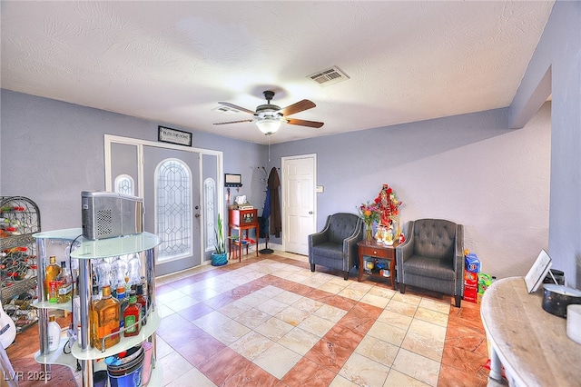 1112 Sandy Cove St, Las Vegas, NV 89110 - living area featuring ceiling fan and light tile patterned flooring