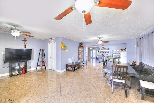 1112 Sandy Cove St, Las Vegas, NV 89110 - tiled dining room with ceiling fan and baseboards