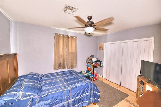 1112 Sandy Cove St, Las Vegas, NV 89110 - bedroom with light tile patterned floors and ceiling fan
