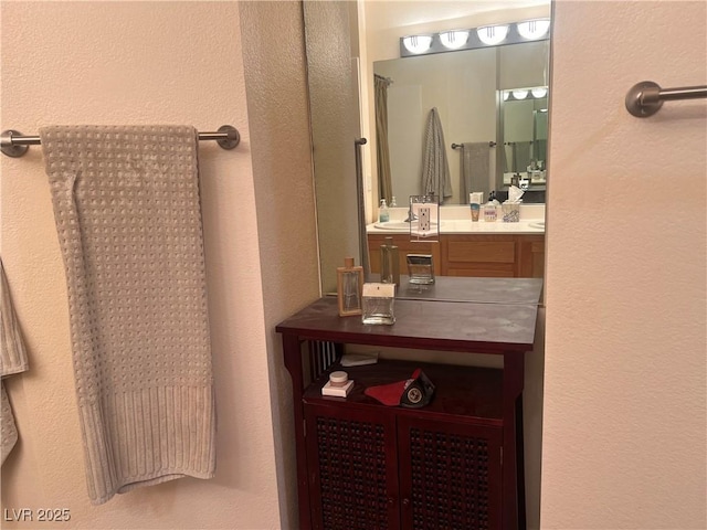 87 E Agate Ave Unit 202, Las Vegas, NV 89123 - full bath featuring vanity and a textured wall