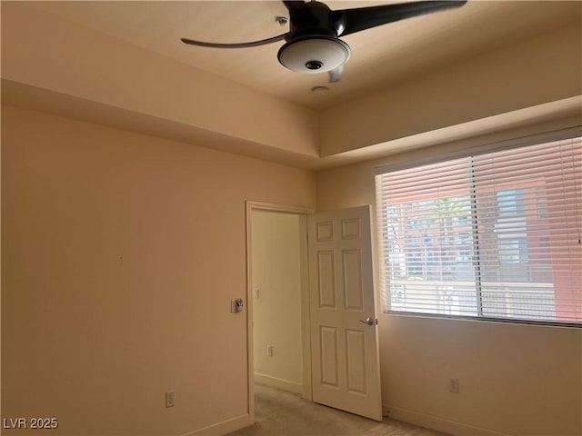 87 E Agate Ave Unit 202, Las Vegas, NV 89123 - empty room featuring ceiling fan, baseboards, and light carpet