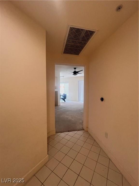 87 E Agate Ave Unit 202, Las Vegas, NV 89123 - hallway with baseboards and light tile patterned floors
